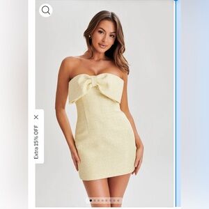 Yellow strapless dress with bow